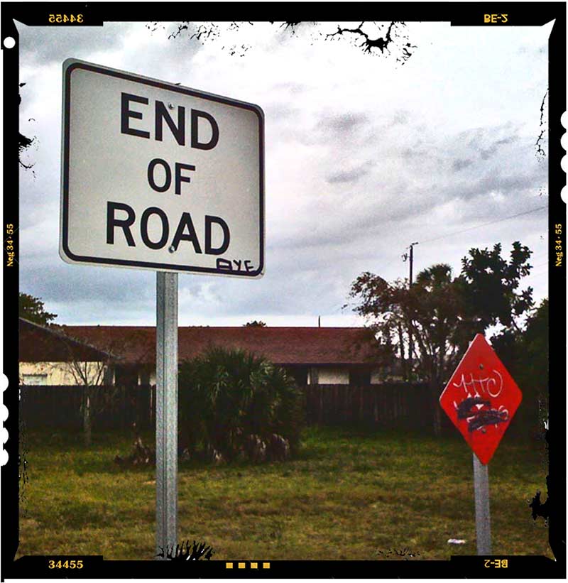 A street sign that reads, End of Road